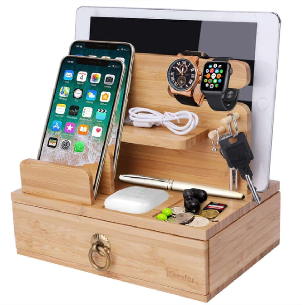 desktop cable organizer clips on a wooden desktop stand with smartphones, tablet, and accessories neatly arranged.