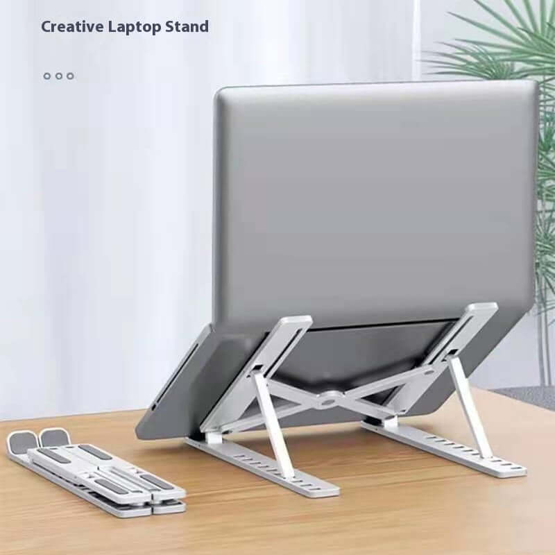 Adjustable laptop stand displayed on a desk, showcasing ergonomic design features.